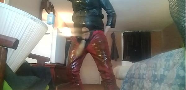  Leather farmer wearing a condom filled with piss and cum